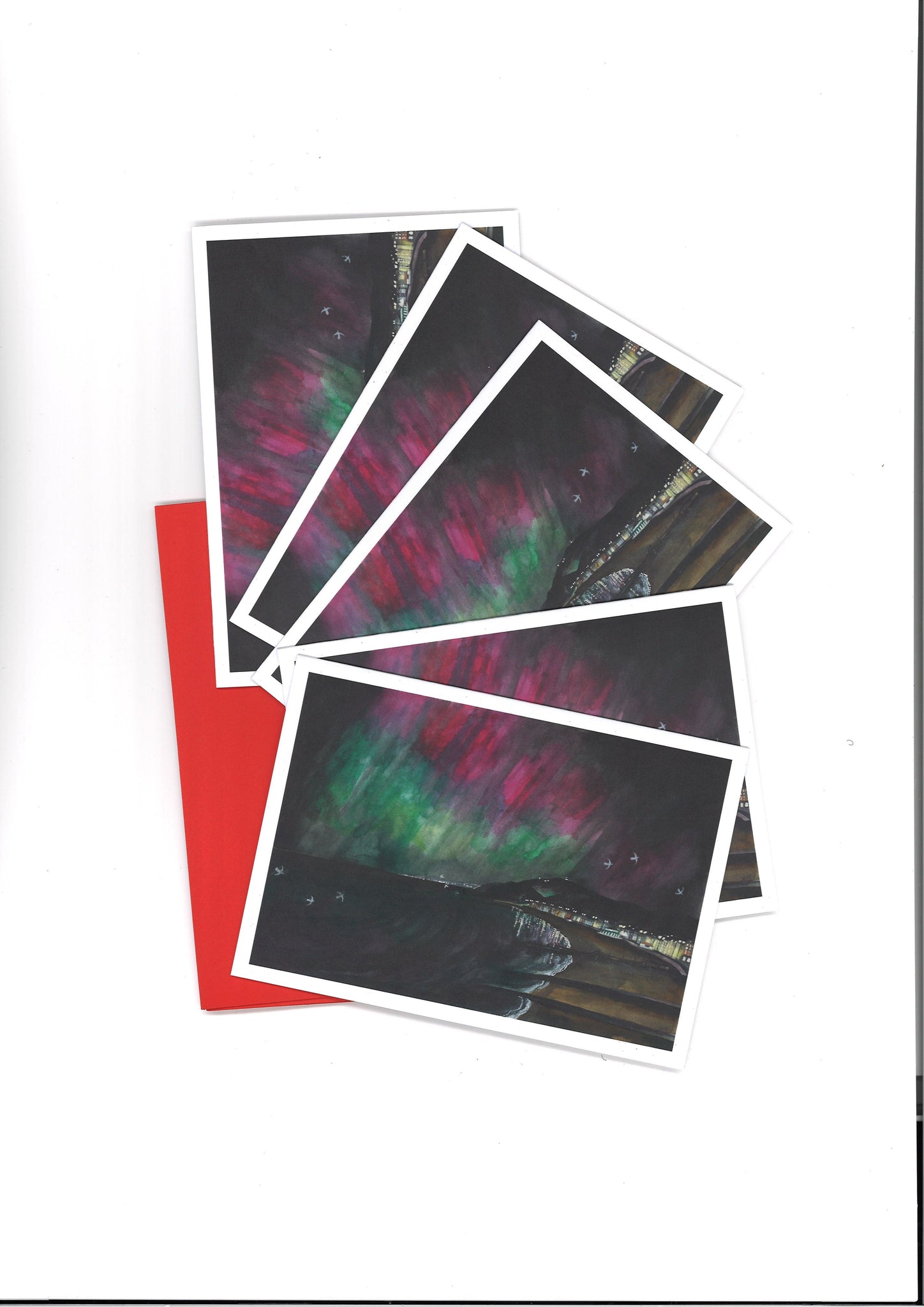 Cardiau Nadolig 'Northern Lights over Aberystwyth' gan Lizzie Spikes