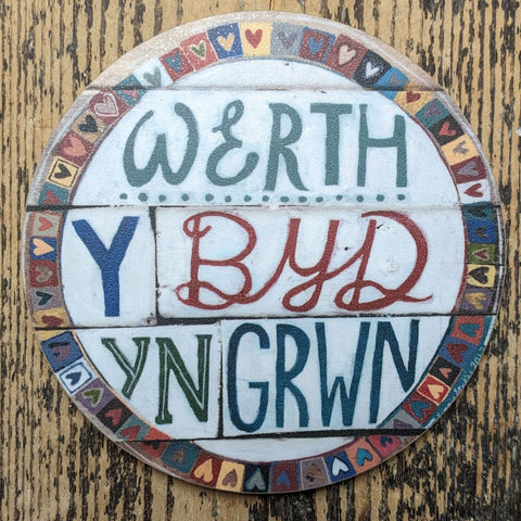 'Werth y Byd yn Grwn' - Round Coaster by Lizzie Spikes