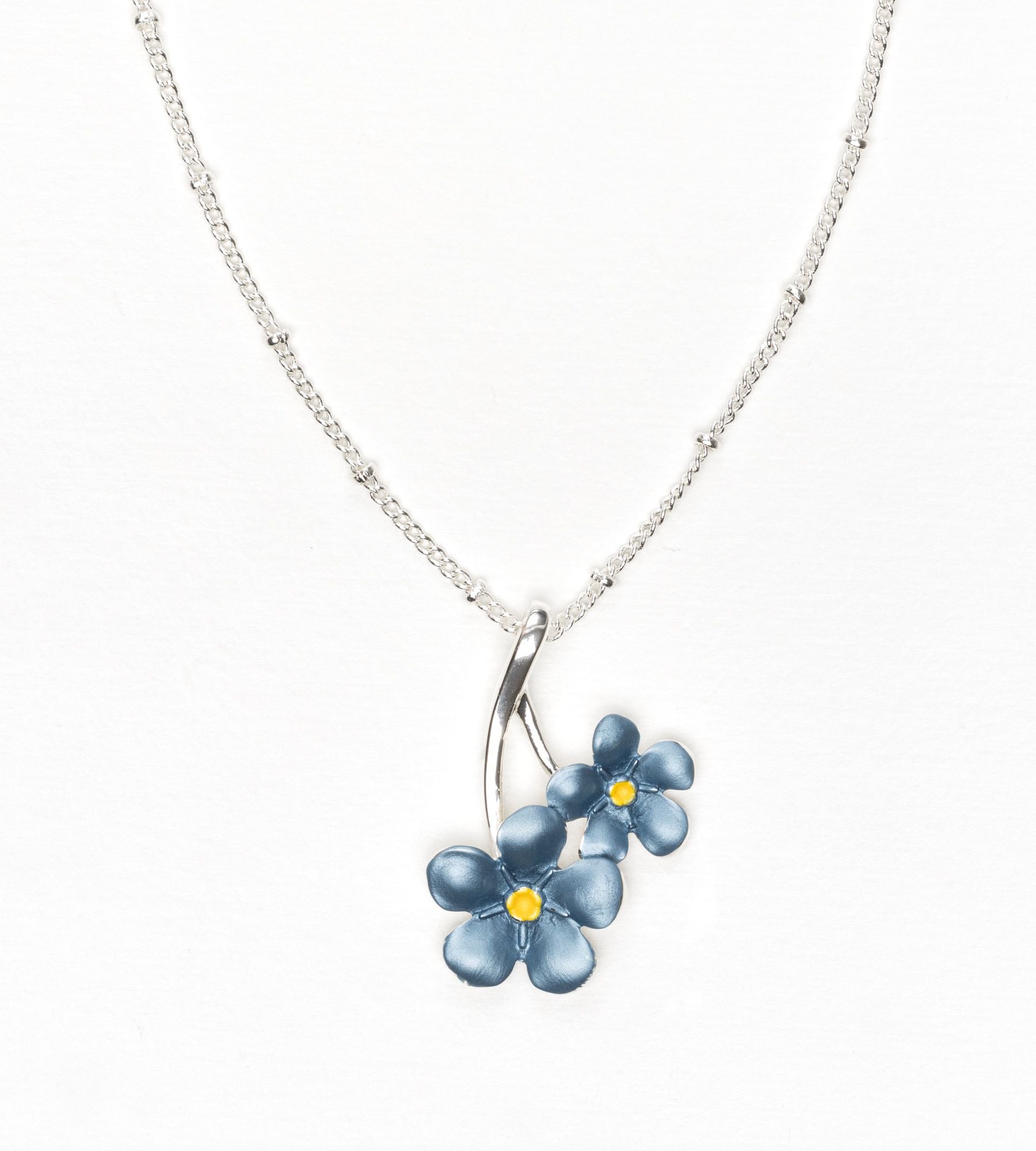 Enamel forget-me-not pendant on silver-plated chain