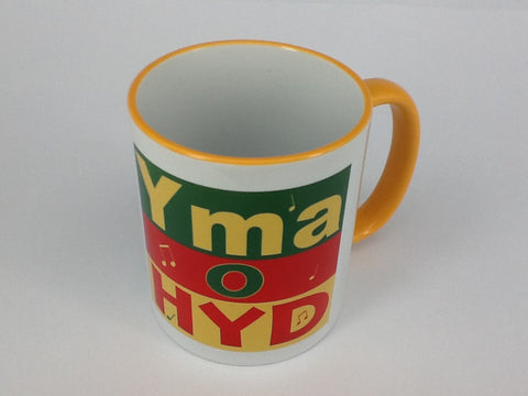 'Yma o Hyd' Dafydd Iwan Mug (yellow rim)